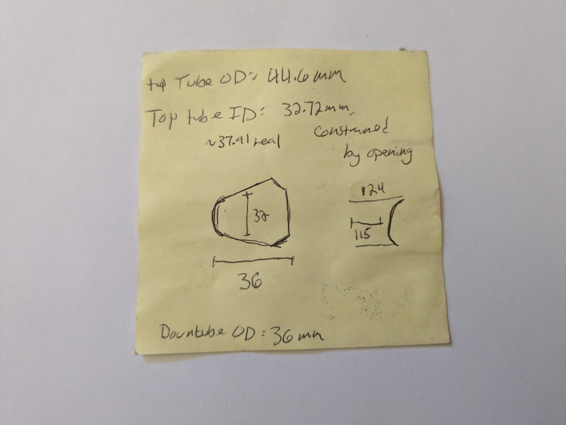 Sticky note with measurements and notes