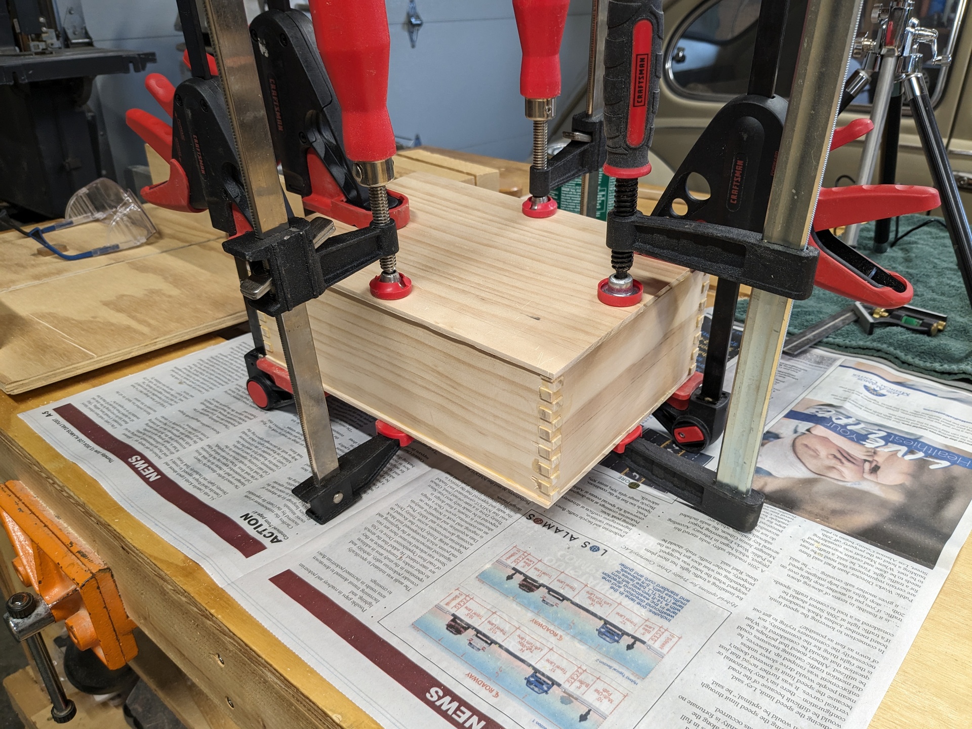 Glued box with clamps all around it