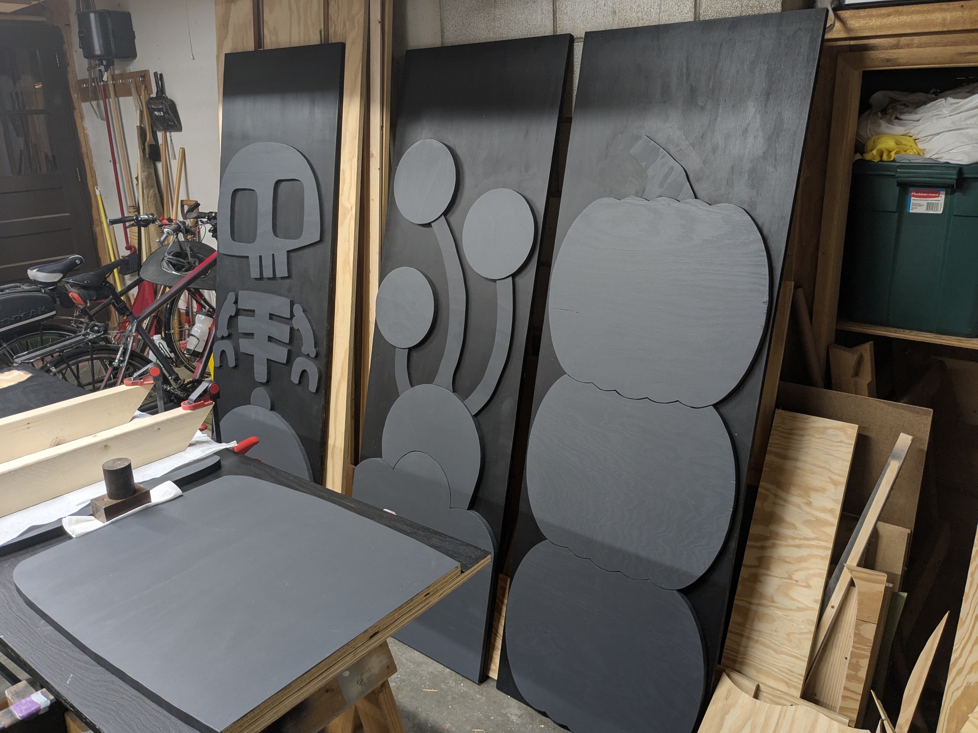 The three layer colors are most visible on the middle one Three finished panels; one panel being glued
