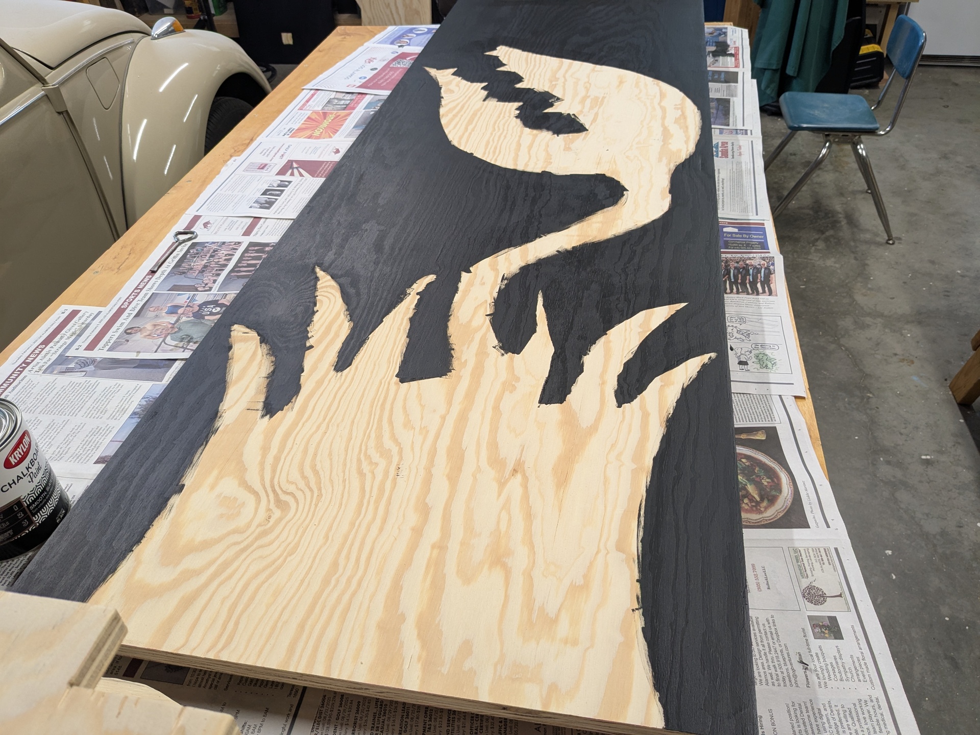 I wasn't going to waste paint on the parts that would get covered up One panel background, fully painted