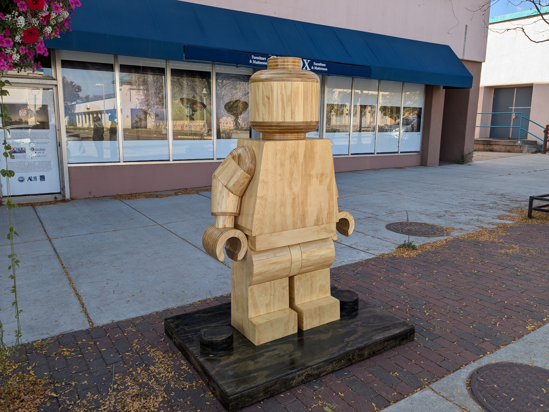 The completed minifig standing in downtown Los Alamos