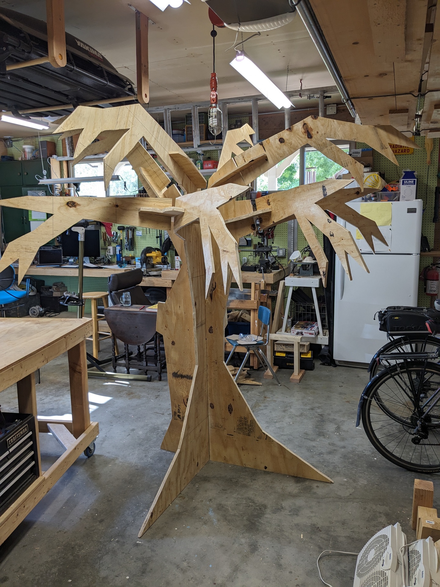One complete tree, unpainted, in the garage