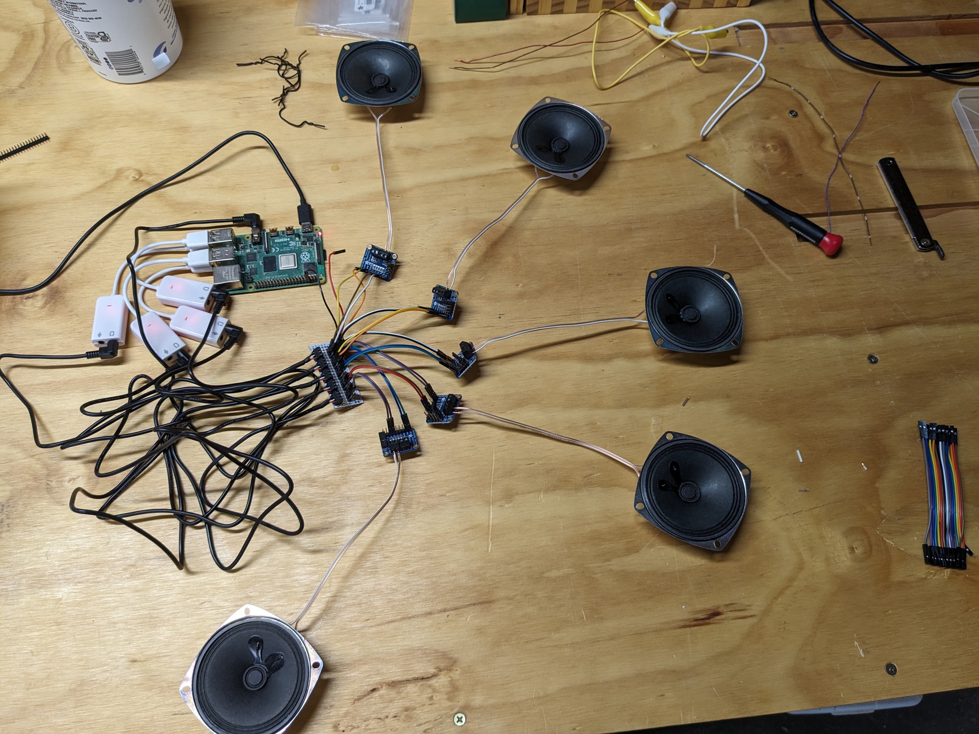 Five speakers hooked up to a Raspberry Pi